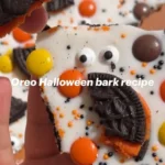 Delicious Halloween Oreo Bark topped with white chocolate and festive sprinkles