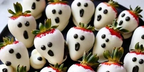 Variety of spooky Halloween snacks set for a movie night